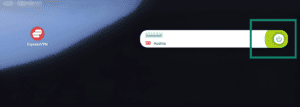  Googlebook home screen ExpressVPN widget in "Connected" state, with the power connection button highlighted in a green box.