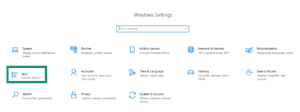 Windows 10 Settings home window showing system categories, with the "Apps" icon highlighted inside a teal box.
