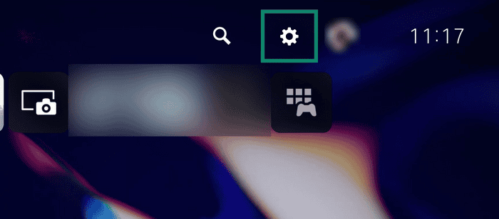 PlayStation console interface showing the top system menu bar, with the gear-shaped "Settings" icon highlighted by a green box.