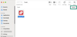 The "Empty" button highlighted in the Trash folder on a Mac, with ExpressVPN in it.