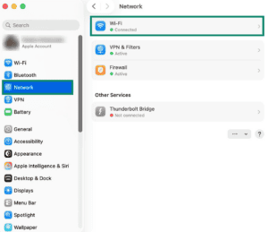 System settings menu on a Mac, showing a highlighted "Network" tab and a "Wi-Fi" connection.