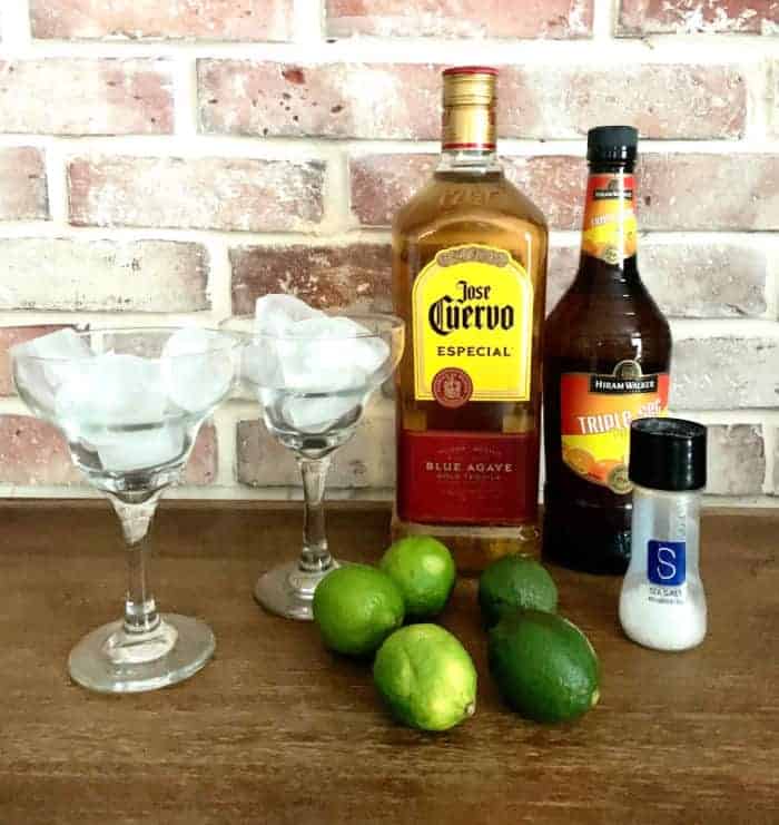 Ingredients for making fresh margaritas with homemade simple syrup.