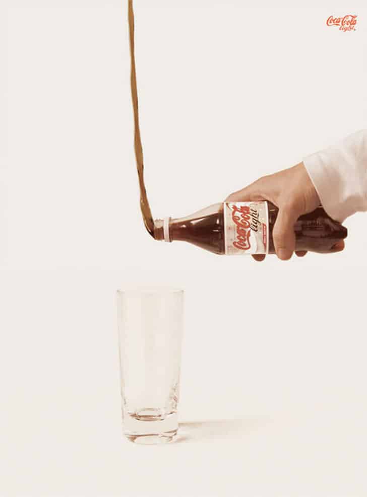 42+ Iklan Media Cetak Lucu Berbentuk Poster Marketing Super Kreatif 24 24. Iklan TV Lucu: Brand "Coca Cola Light" - Design Erlistic