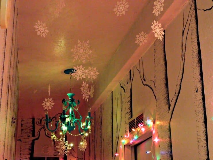 snowflake ornaments hanging from the ceiling