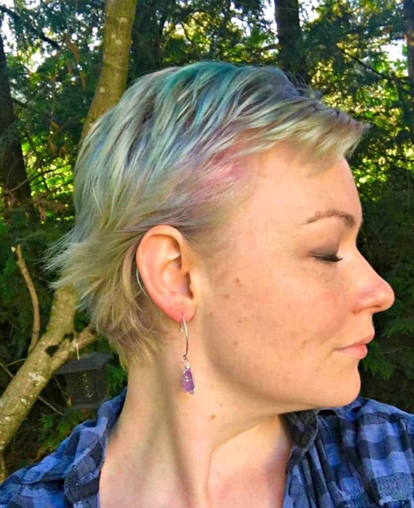 mermaid hair dye. Profile shot of blue purple and green hair