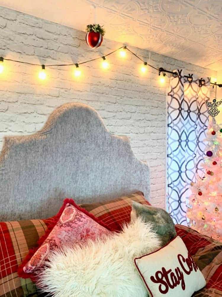 plaid bedspread with fluffy pillows