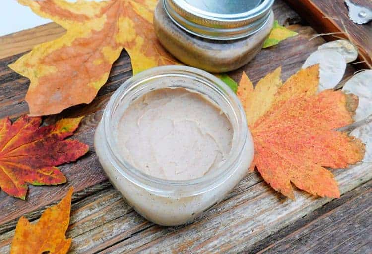 pumpkin spice deodorant in mason jar on wood tray with fall leaves