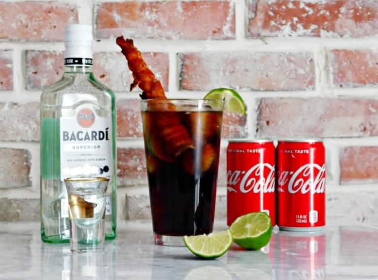 rum and coke with a bacon straw