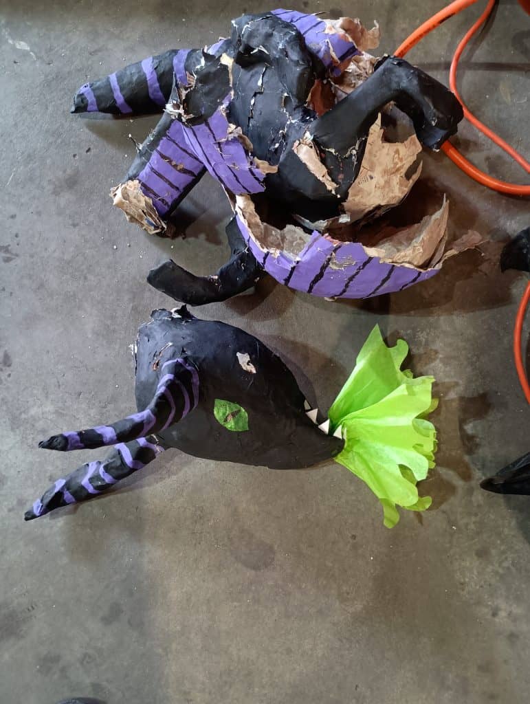 Picture of a Maleficent dragon pinata broke in several pieces