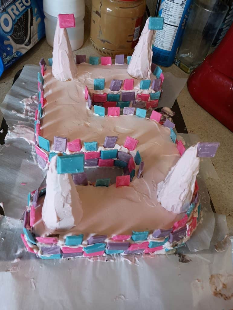 Picture of a Disney princess cake in the shape of a 5