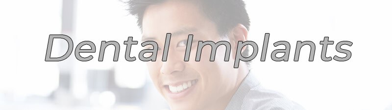 Sachar Dental NYC: Dental Implants Dentist NYC for dental Implants Image of smiling man.