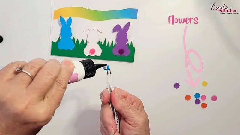 Adding mini Pom Poms as Bunny tails is a cute way to add dimension.