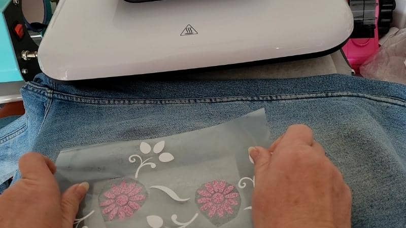 Testing the placement of the HTV design to ensure the layers will line up correctly