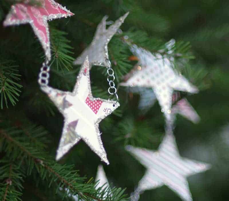 stars cut out of paper and hanging from chain