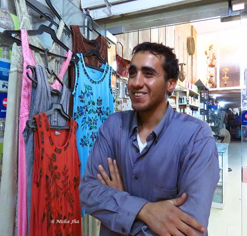 Ayman in his shop and below, with me. He tied the Keffiyeh on my head.