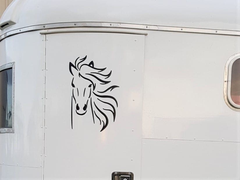 Horse decal cut out with the Scan N Cut and placed onto a horse float