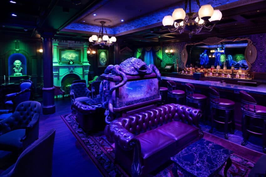 Aboard the Disney Treasure, the Haunted Mansion Parlor honors more than five decades of fandom and introduces the world to the next chapter of the Haunted Mansion saga. Guests will enjoy spooktacular, specialty cocktails themed to the classic Disney Parks attraction and its inhabitants, as well as a variety of Haunted Mansion details from around the world. (Kent Phillips, photographer)