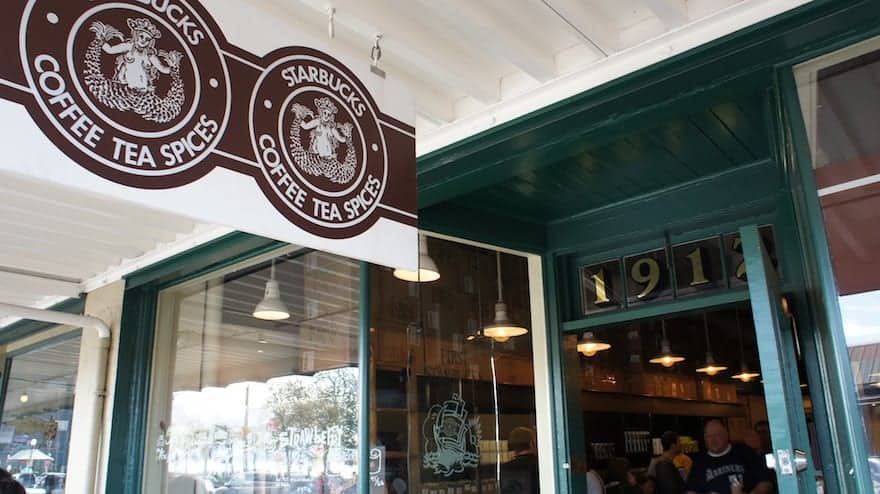 Sign showing coffee, tea and spices available at original Pike Place Starbucks