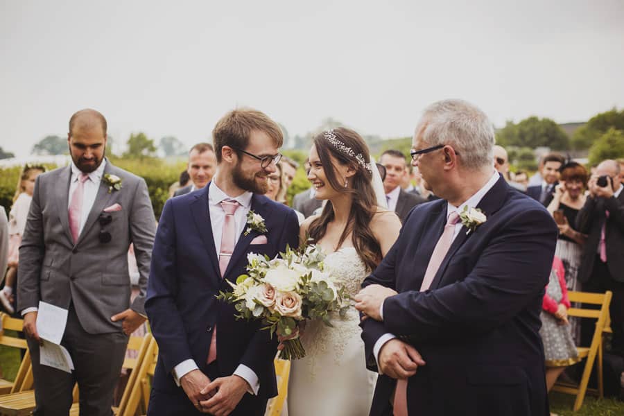 a bride being given away by father