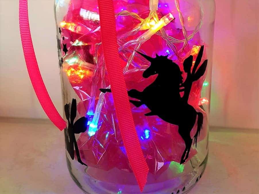 Fairy light jar with pink cellophane and lights