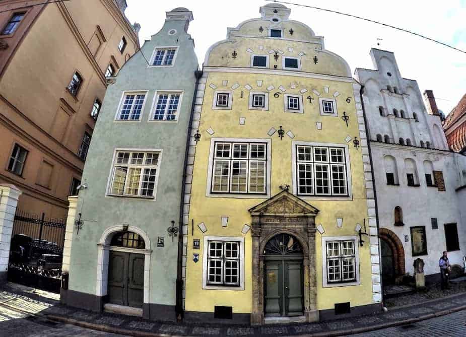 three tenement houses connected together colorful