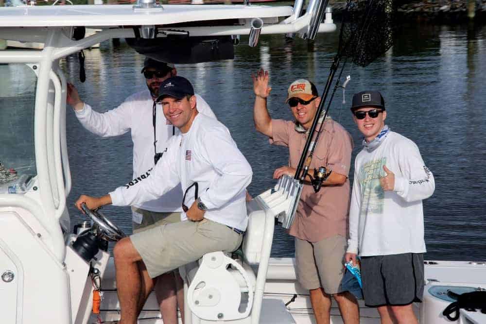 Captain Doug Root and his anglers take to the water. Photo by Martin image photography.
