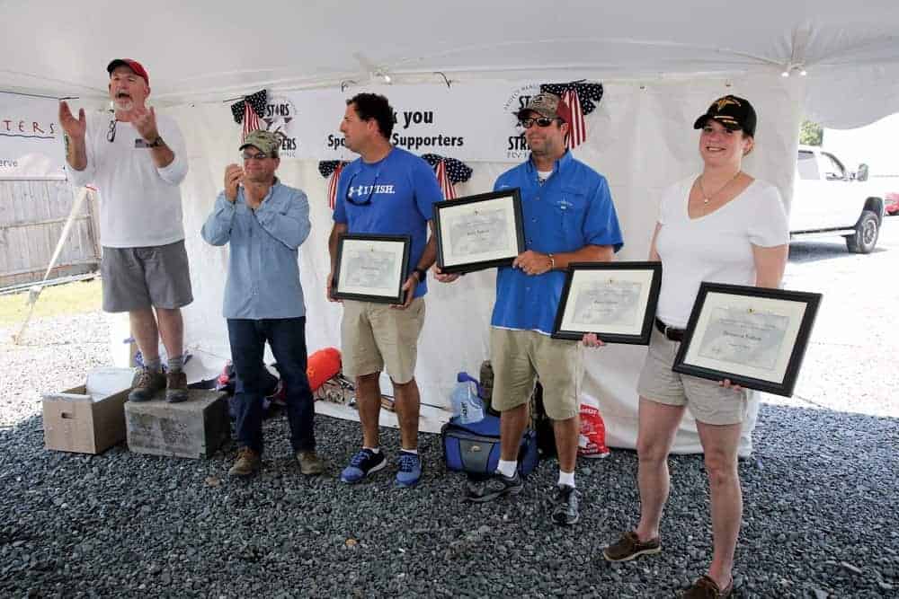 The Fulton family accepts awards for service to the program. Photo by Martin image photography.
