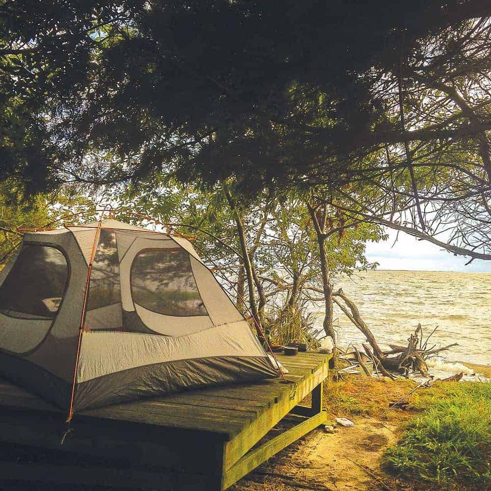 A cozy Long Point campsite overlooking Old House Cove. Photo by Ashley Stimpson