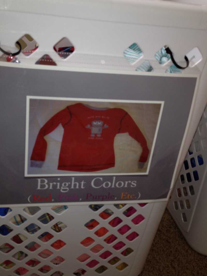 Signs on Laundry Basket for Children: Labeled "Bright Colors: Red, Pink, Purple, Etc." and showing a red pajama shirt.