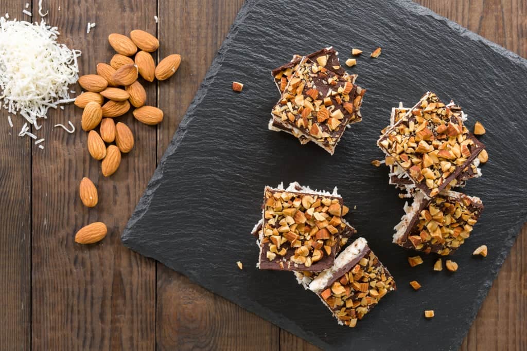 Coconut Cream Bars Easy no-bake coconut cream bars with layers of cocoonut, chocolate and toasted almonds, they're a delight to make and a joy to eat.