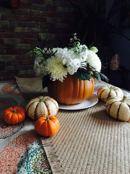 centerpiece for thanksgiving table made out of pumpkin