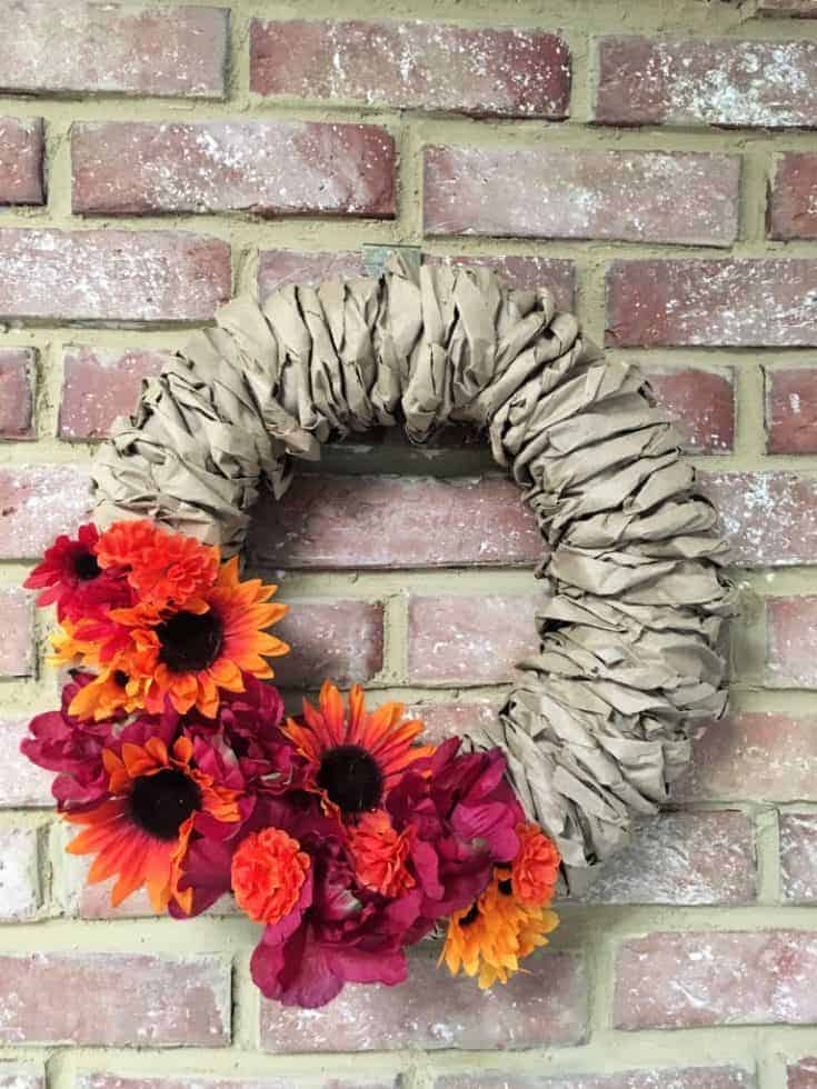 paper bag wreath completed with added flowers