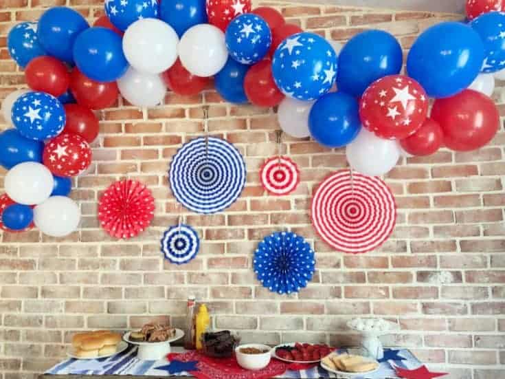 red white and blue balloon arch