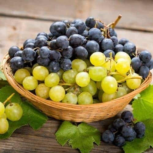 red and green grapes in a bowl