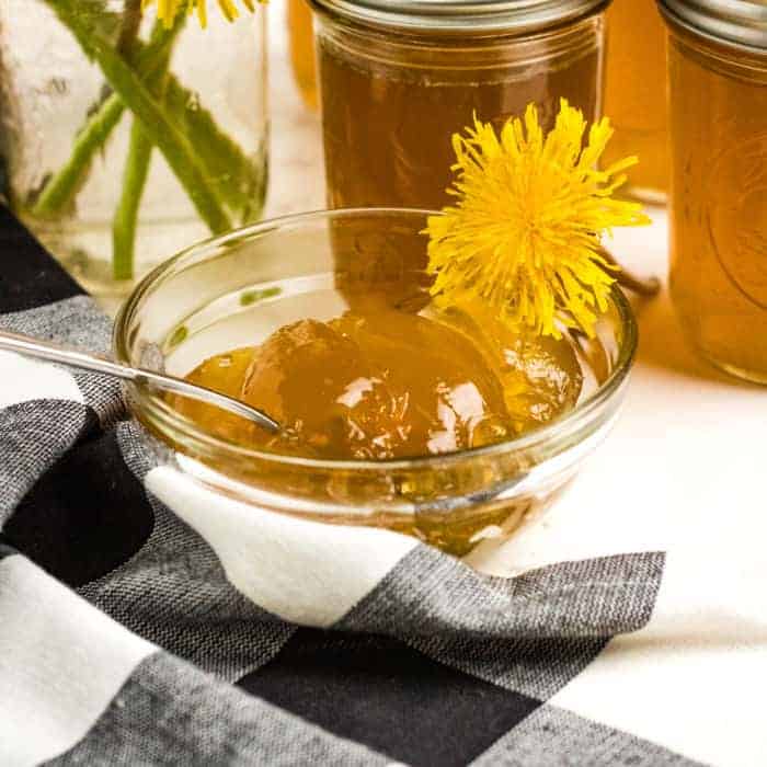 Dandelion jelly in a glass bowl.