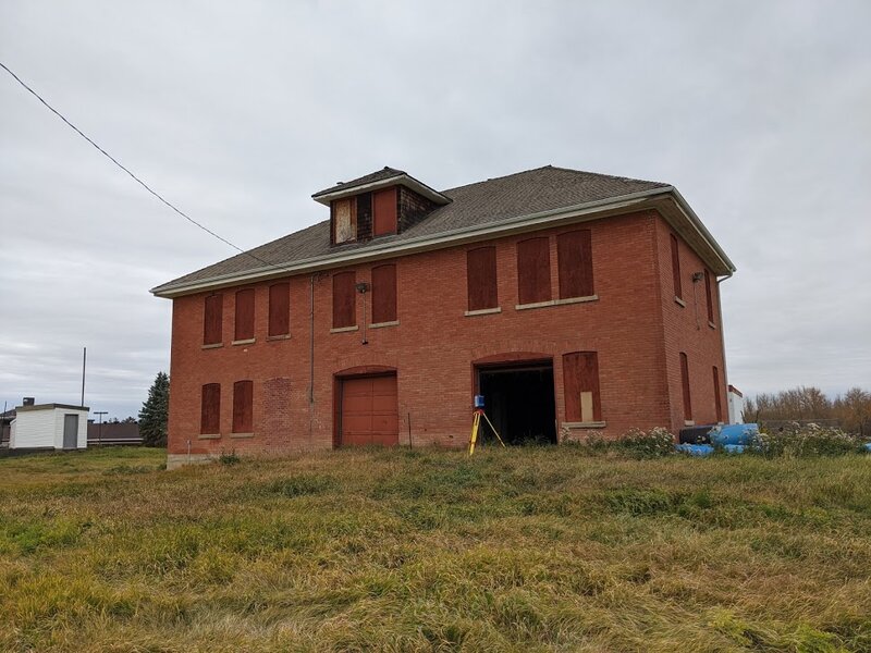 Exterior of the carriage house during documentation with Z+F 5010X terrestrial laser scanner, visible in the open door. October 20202. From Madisen Hvidberg.