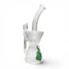 Angled side view of Medicali Turbine Hourglass Dab Rig with clear glass body, green flame logo, and curved mouthpiece.