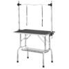 Adjustable arm pet grooming table for different dog sizes