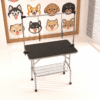 Professional pet grooming table for dogs with non slip surface and storage basket