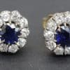 Stunning sapphire and diamond earrings with gold settings, perfect for special occasions.