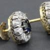 Gold and silver earrings with sapphires and diamonds for women.