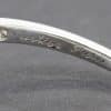 Elegant Cartier diamond ring with engraved inscription.