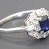 Silver ring with a central blue sapphire and surrounding diamonds, jewelry from Weldons Jewellers.