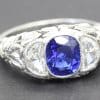 Stunning sapphire and diamond ring with intricate silver band design.