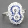 Beautiful sapphire and diamond ring with intricate design and sparkling gemstones. Perfect for speci.