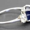 Silver ring with blue sapphire and diamond accent, jewelry from Weldons Jewellers.