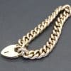 Gold chain with a padlock clasp for jewelry security and style.