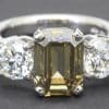An emerald-cut diamond ring with side stones, crafted by Weldons Jewellers, Dublin.