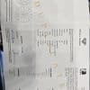 Diamond certification document showing diamond cut, clarity, and carat weight.