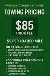 Freeway Towing & Storage pricing chart showing $85 hook fee and $5 per loaded mile in Surprise AZ